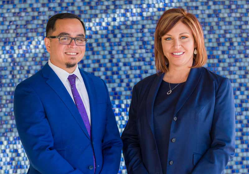 Photo of attorneys Daniel R. Ortega, III and Alane M. Ortega